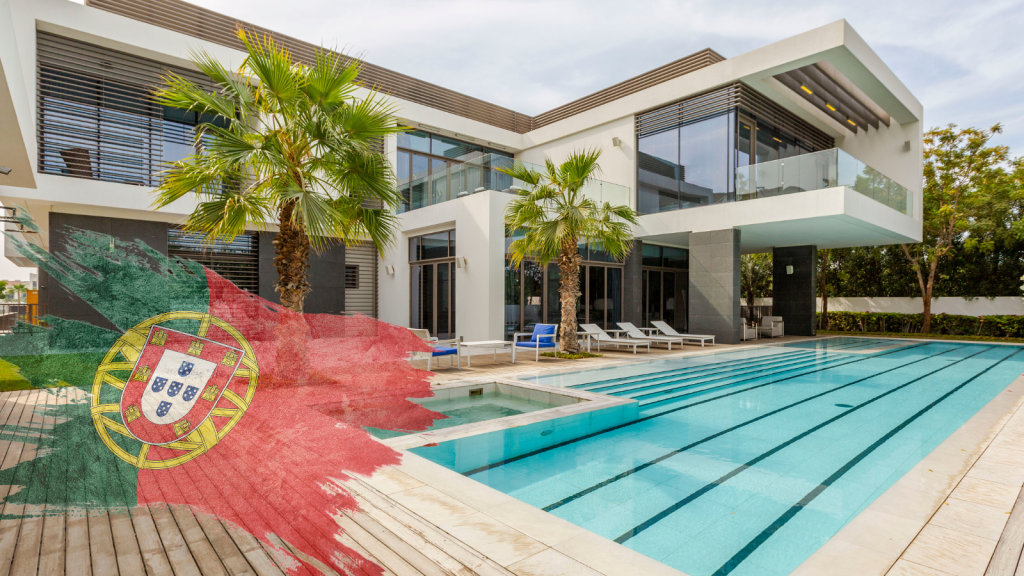 Modern villa with pool in Portugal, surrounded by nature, with the Portuguese flag waving in the foreground – Invest in real estate with crypto in Portugal through Vicox Legal.