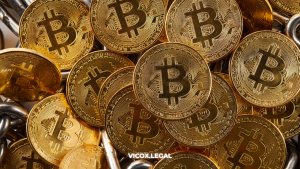 Bitcoin coins representing crypto assets used to buy and inherit real estate in Spain – Vicox Legal